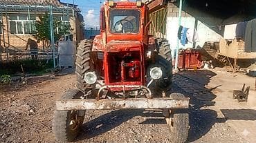 другой: Трактор колесный, класс тяги около 1,4–2,0. Кабина закрытая — 4