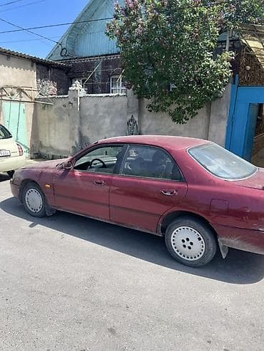 cruiser 80: Mazda Cronos: 1990 г., Седан — 3