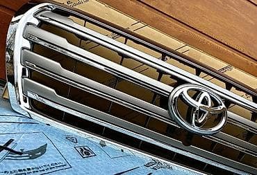 Лючки бензобака: Решетка радиатора Toyota Оригинал — 1