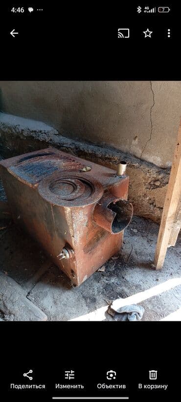 Металлическая печь для обогрева, предназначенная для установки в