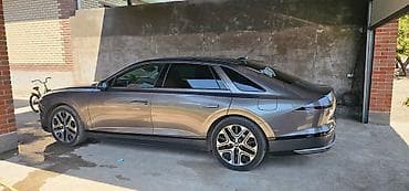 geely galaxy e5: Hyundai Grandeur: 2022 г., Седан — 4