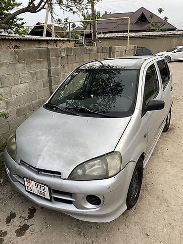 mazda 121: Daihatsu YRV: 2002 г. — 7