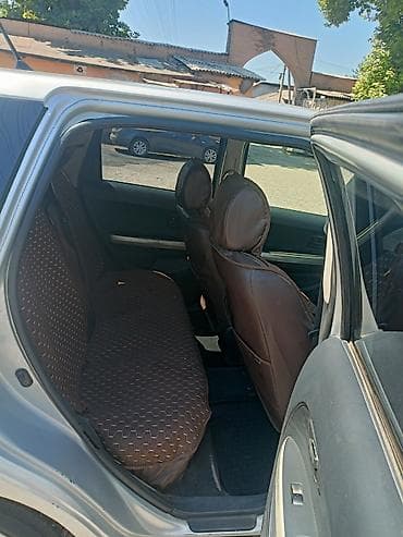 Toyota Ist: 2003 г., 1.5 л, Автомат, Бензин, Хетчбек — 5