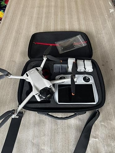 параплан купить: DJI Mini 3 + пульт DJI RC (с экраном) — комплект для аэрофото и видео — 7