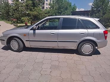 dodje ram: Mazda Familia: 1999 г., 1.6 л, Механика, Бензин, Универсал — 5