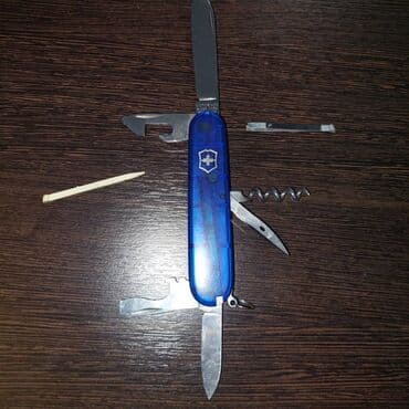 дом вещи: Мультитул-нож Victorinox (швейцарский армейский нож) с красными — 4