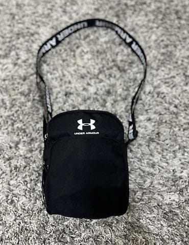 Сумка через плечо Under Armour (черная) - Компактная повседневная