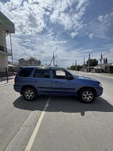 step 2: Mazda Tribute: 2003 г., 2 л, Автомат, Газ, Кроссовер — 2