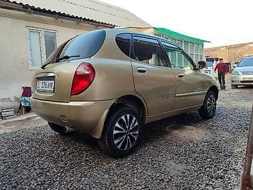 bid e2: Daihatsu Sirion: 2000 г., 1 л, Автомат, Бензин, Хэтчбэк — 6