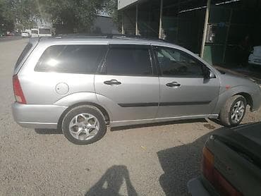 балка на фит: Ford Focus: 2000 г., Универсал — 3