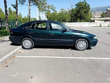 7 00 r16: Mazda 626: 1997 г., 1.8 л, Механика, Бензин, Седан — 4