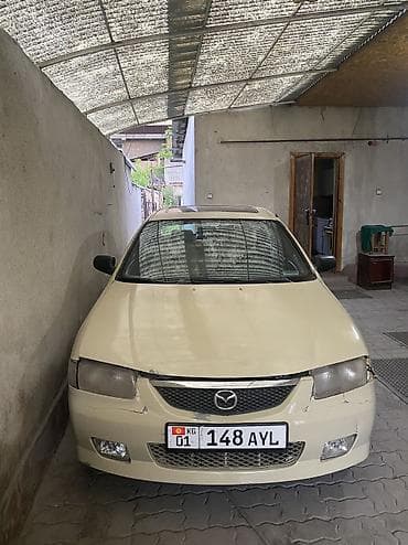 4a fe: Mazda 323: 1995 г., 1.6 л, Автомат, Бензин, Седан — 1