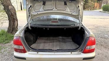 капот степ: Mazda 323: 1999 г., 1.6 л, Ручные, Бензин, Седан — 8