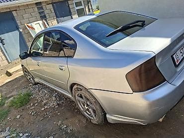 резиновый х**: Subaru Legacy: 2005 г., 2 л, Автомат, Седан — 5