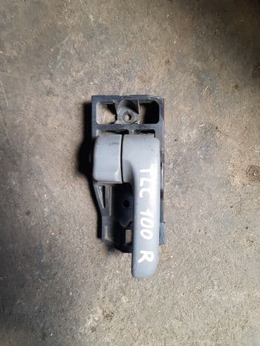 Toyota Land Cruiser 100, ручка дверная внутренняя. Тойота Ленд Крузер