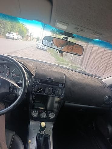 Унаа: Mazda 6: 2005 г., 2 л, Кол менен иштөөчү, Бензин, Седан — 4