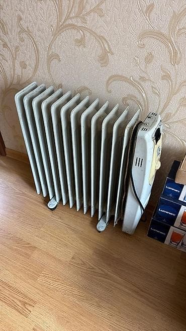 обогреватели масляные: Масляный обогреватель Кол-во секций: 10 и более, Несколько режимов мощности — 1