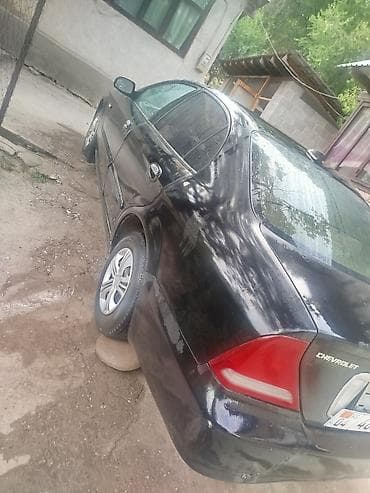 Транспорт: Daewoo Magnus: 2001 г., 2 л, Механика, Бензин, Седан — 5