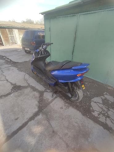 100 с3: Макси-скутер Yamaha, 125 куб. см, Бензин — 3