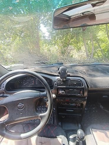 Nissan Sunny: 1991 г., 1.6 л, Ручные, Бензин, Седан — 5