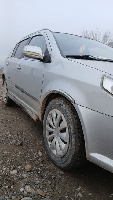 suzuki aerio: Geely MK Cross: 2012 г., 1.5 л, Механика, Бензин, Хэтчбэк — 3