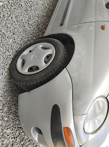 капот демио: Daewoo Matiz: 2001 г., 0.8 л, Механика, Бензин, Хэтчбэк — 4