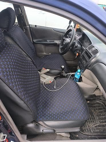 продаю бетономешалки: Mazda 323: 2001 г., 1.6 л, Механика, Бензин, Хэтчбэк — 6