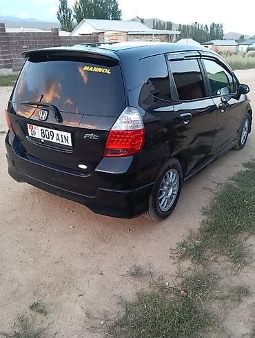 рул фит: Honda Fit: 2003 г., 1.3 л, Вариатор, Бензин, Хетчбек — 6