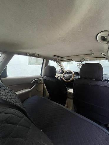 рено пренум: Ford Focus: 2001 г., 2 л, Автомат, Газ, Универсал — 9
