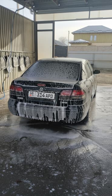 перевозной дом: Toyota AB: 1999 г., Седан — 1