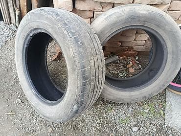 шлем кролик: Две автомобильные шины летнего типа. Судя по рисунку протектора — — 1