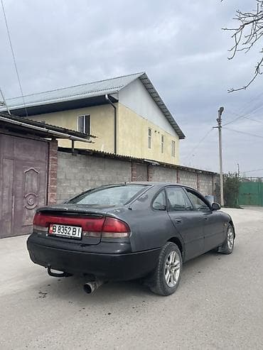 бокус авто: Mazda 626: 1995 г., 2 л, Ручные, Бензин, Седан — 3