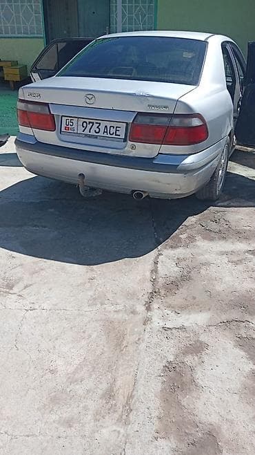 kia singer: Mazda 626: 1999 г., 1.8 л, Механика, Бензин, Седан — 4