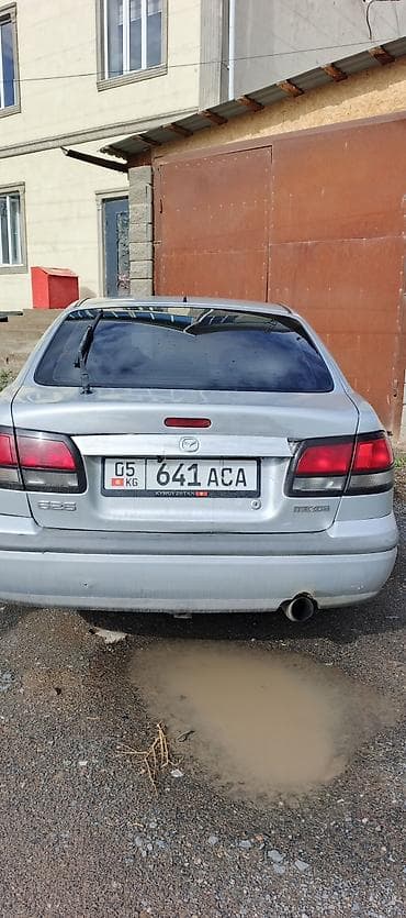 с4 2 3: Mazda 626: 1998 г., 1.8 л, Механика, Бензин, Хэтчбэк — 6
