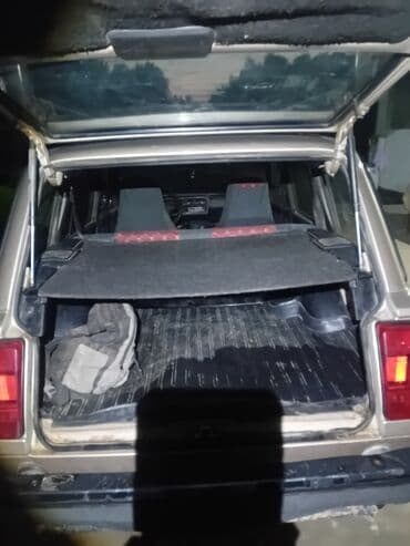 опель вектра а: Универсал Lada 2104 бежевого цвета, оснащенный багажником на крыше — 3