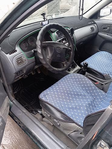 задний бампер 124: Mazda Familia: 1998 г., Бензин, Седан — 9