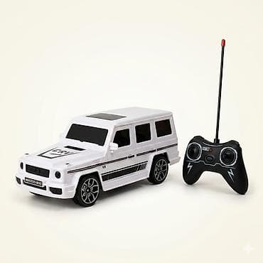 машина на пульт управления: Радиоуправляемая модель автомобиля SUV (стилизованный внедорожник) с — 1