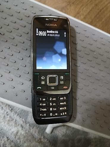 nikon d5100: Nokia E66 — 5
