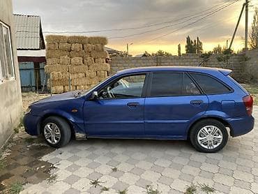 5: Mazda 323: 2003 г., 1.3 л, Механика, Бензин, Хэтчбэк — 5