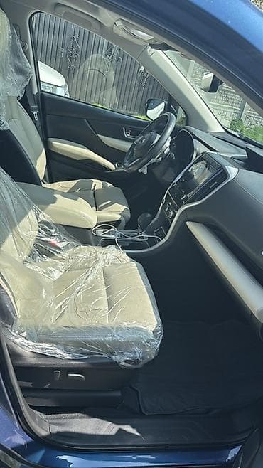 mini car: Просторный 3‑рядный кроссовер синего цвета. Основные особенности: - — 2