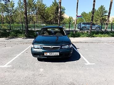 7 00 r16: Mazda 626: 1997 г., 1.8 л, Механика, Бензин, Седан — 1