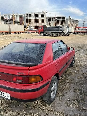 a2 group: Mazda 323: 1993 г., 1.6 л, Автомат, Бензин, Лифтбек — 4