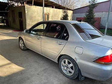 Mitsubishi Lancer: 2004 г., 1.6 л, Механика, Бензин, Седан
