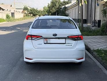 camry 55 se: Toyota Corolla: 2021 г., 1.8 л, Автомат, Гибрид, Седан — 2