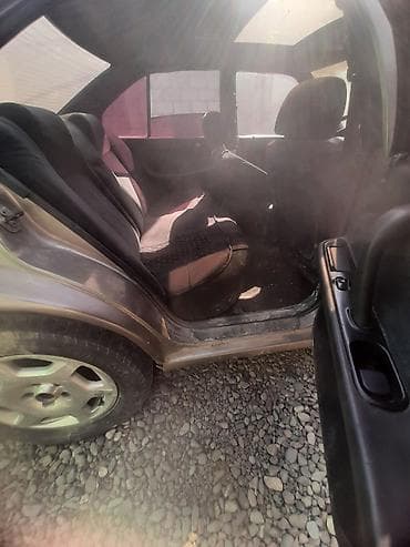 краска на авто: Седан среднего класса, 4 двери. Кузов: темно‑бронзовый/коричневый — 2