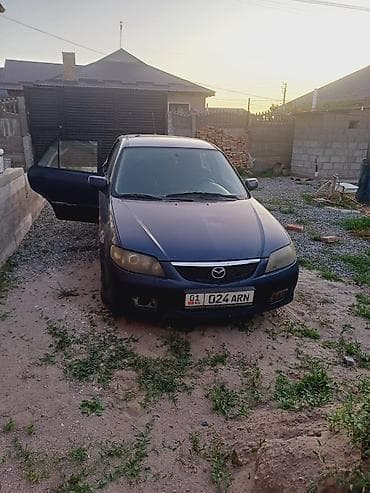 thindiag 2: Mazda Familia: 2002 г., 2 л, Механика, Дизель, Хэтчбэк — 1
