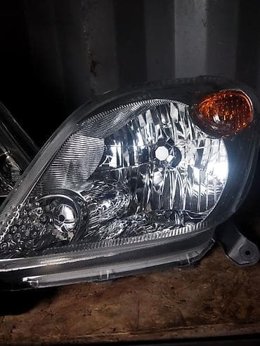 spark 7: Комплект передних фар Toyota 2001 г., Новый, Аналог, Китай — 2