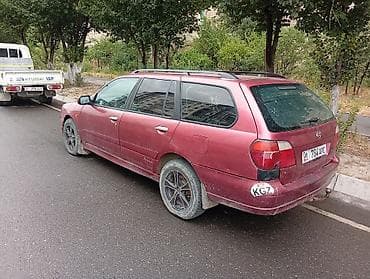 red cell: Nissan Primera: 2000 г., 2 л, Механика, Бензин, Универсал — 2
