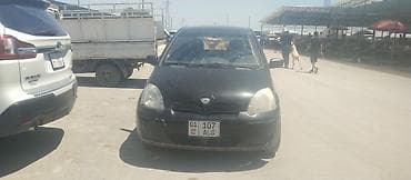 mini cuper: Toyota Yaris: 2004 г., 1.3 л, Механика, Бензин, Хэтчбэк — 4