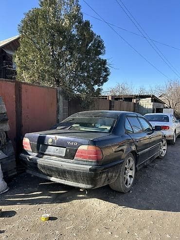 audi 100 2 3: BMW 740: 1995 г., 4 л, Автомат, Бензин, Седан — 4